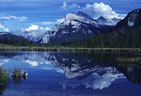 Mount Rundle reflected in the third of the Vermilion Lakes in Banff National Park.