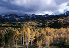 Storm builds over peaks of east Sneffels Range, from Ouray County Road 7A.