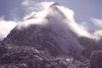 A clearing snowstorm dusts the landscape north of Sugarloaf Peak. Organ Mountains, New Mexico