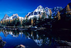 Mount Huber and Wiwaxy peak reflected in a quiet pool on Opabin Plateau.