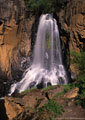 South Clear Creek Falls, with surrounding walls textured by early morning light.